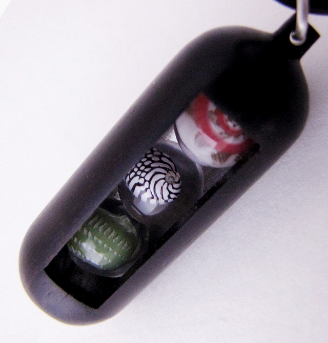 Ebony with Pink Umbonium, Zebra shell and Emerald Nerite spheres : $275